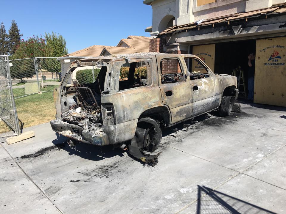When cars get stuck in a burning garage, the results are usually less than positive. This SUV won't be heading up to the snow anytime soon. So, who do you call?