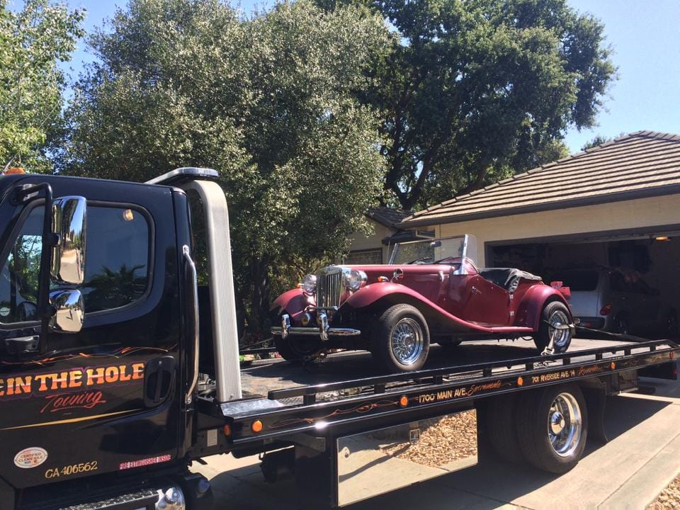 Rocklin Ace Towing specializes in towing classic cars and trucks. If you need a classic vehicle tow, like this beautiful Jag, call Rocklin Ace Towing for the best towing company in Rocklin. If you are into things English, visit the best English Pub in the area and go to the Boxing Donkey in Roseville. It is a favorite of many of our drivers, and great way to have mug of stout and get great information on the fine points of towing a Jag. See you at the Boxing Donkey.